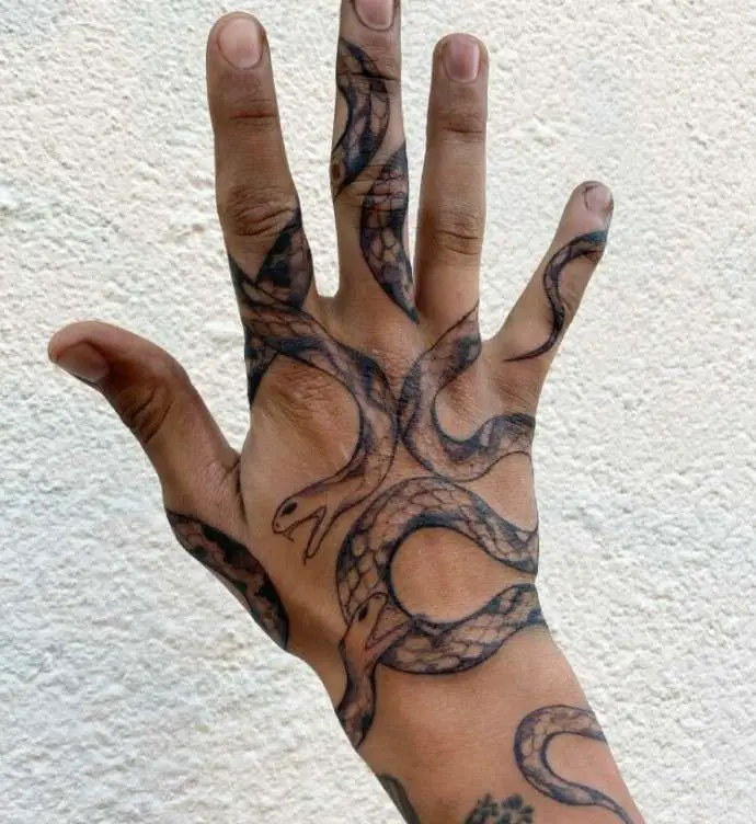 Snake finger tattoo design