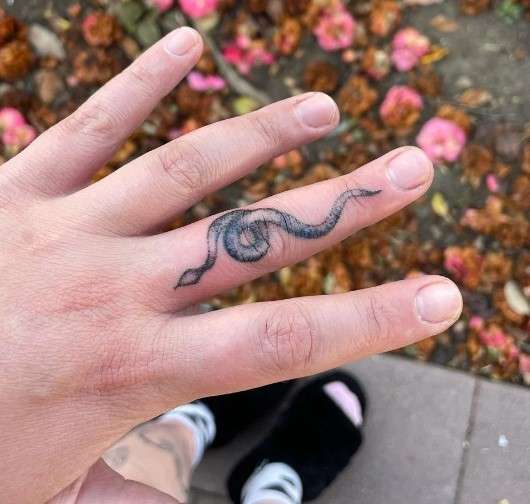 Snake finger tattoo design
