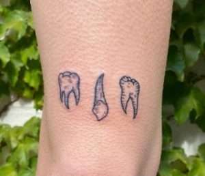 Tooth Tattoo Meaning