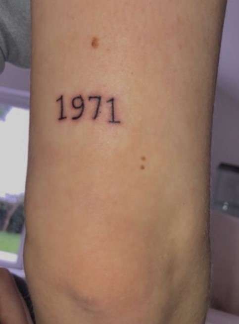 1971 Tattoo on arm