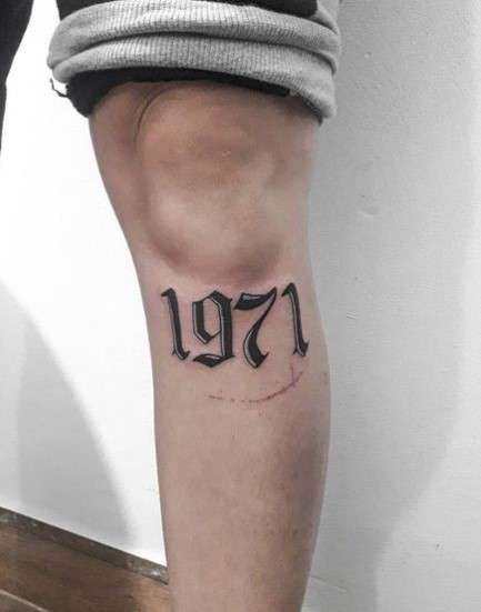 1971 tattoo on leg