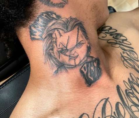 Chucky Tattoo on neck