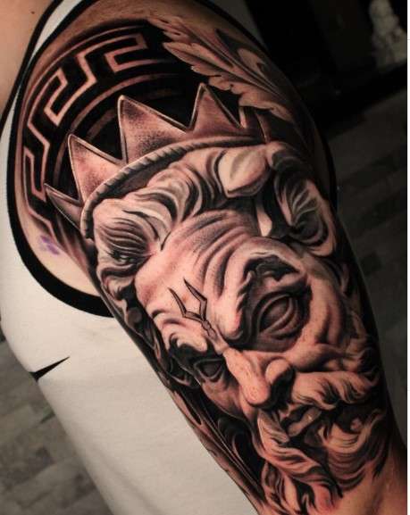 Hades tattoo on arm