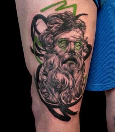 Hades tattoo on leg