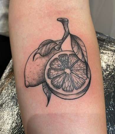 lemon tattoo on hand