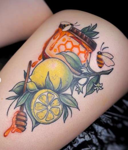 lemon tattoo with honey bee design