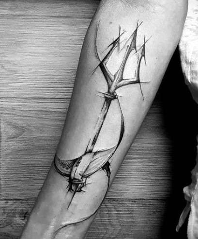 trident on hand tattoo