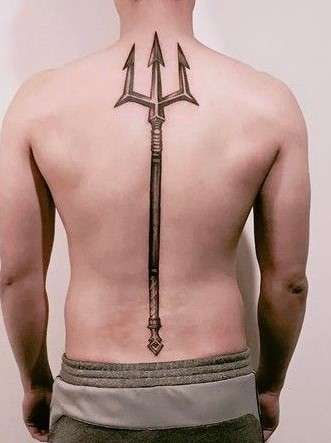 trident on spine tattoo