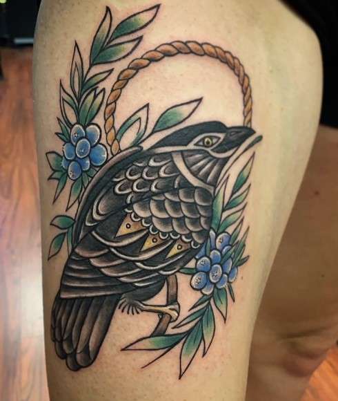 juniper tattoo with raven bird