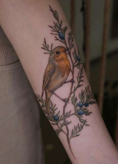 juniper tattoo with little bird