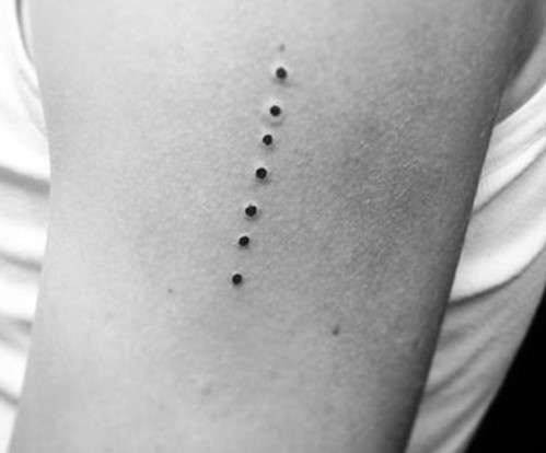 7 dots tattoo meaning