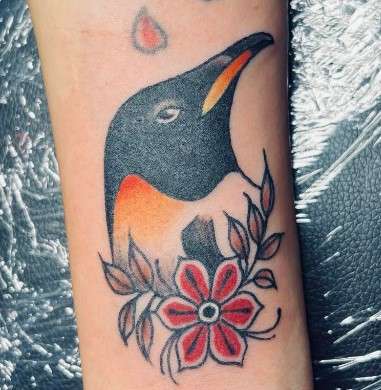 colorful penguin tattoo design