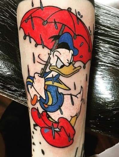 Donald duck tattoo with umbrella
