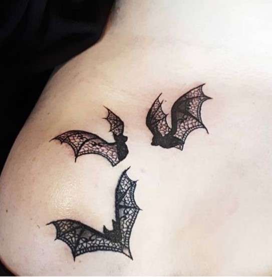 Feminine Bat tattoo on shoulder