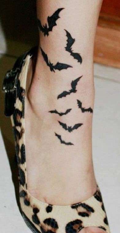 Feminine Bat tattoo on upper toe