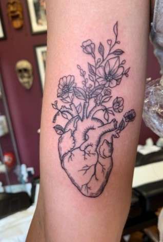 Anatomical Heart Tattoo With Flowers 