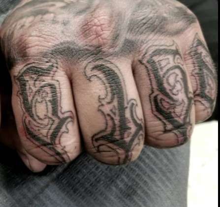 5150  fist Tattoo 