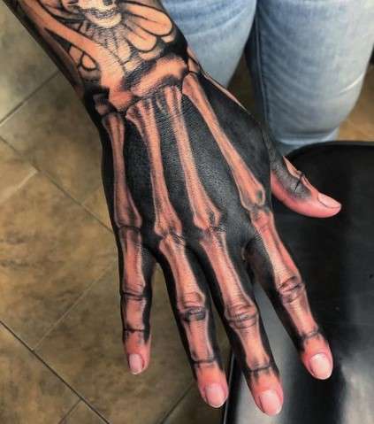 Bone hand tattoo design