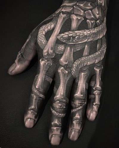 Snake and Bone hand tattoo