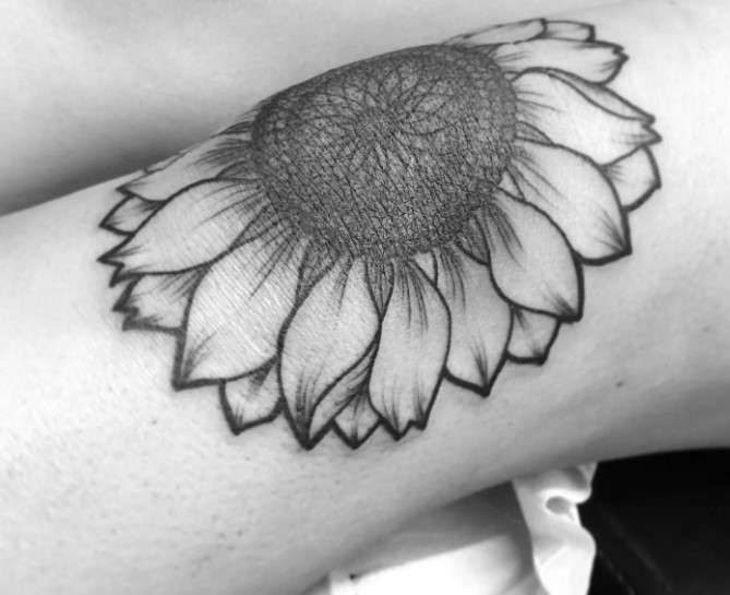 black And White Sunflower tattoo on knee