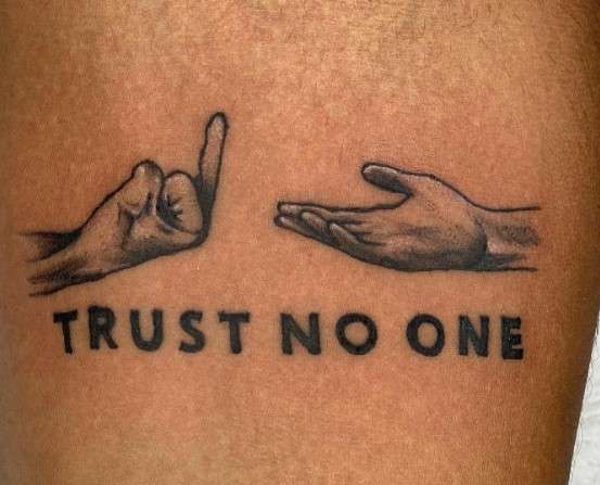 Trust No One Tattoo meaning