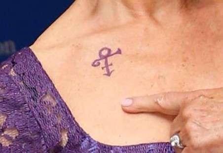 Helen Mirren's prince symbol tattoo design