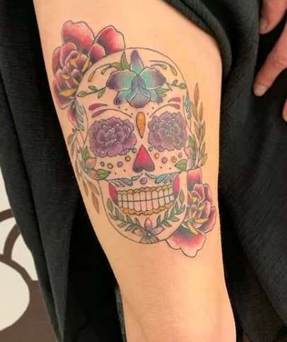 Dia de los muertos flower skull tattoo