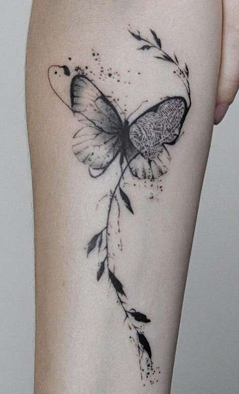 Whimsical butterfly tattoo on leg