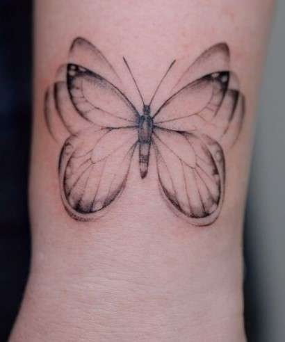 Whimsical butterfly tattoo live