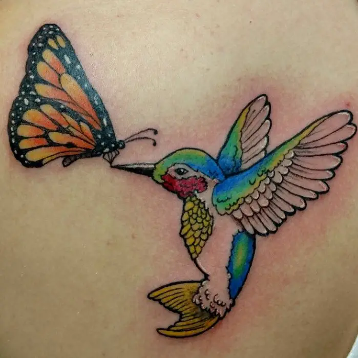 Whimsical butterfly hummingbird tattoo