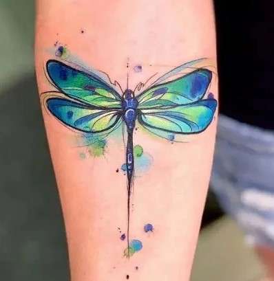 Whimsical dragonfly tattoo paint
