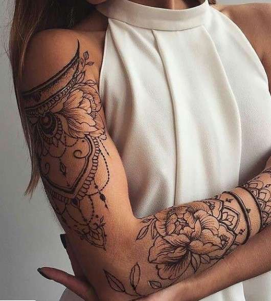 Whimsical tattoo sleeve mandala
