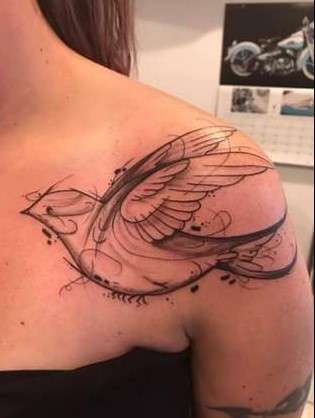 artistic Whimsical bird tattoo