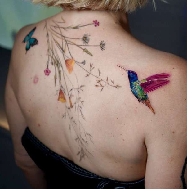 Whimsical bird tattoo butterfly and hummingbird
