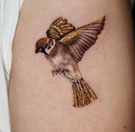 Whimsical bird tattoo gold