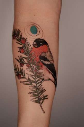 Whimsical bird tattoo with fruit