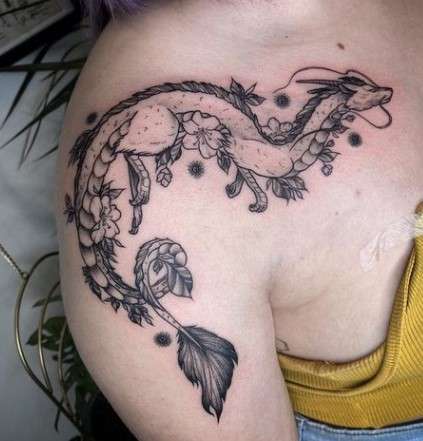 Whimsical flower Dragon tattoo