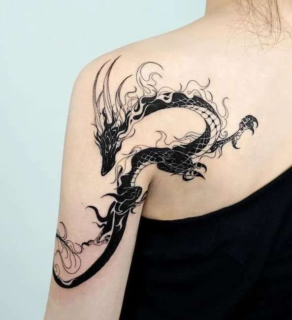 Whimsical dark Dragon tattoo 