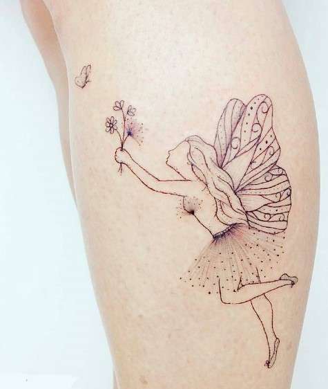 Whimsical playing Fairy tattoo