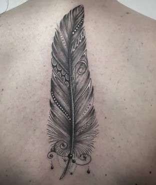 Whimsical feather tattoo neck
