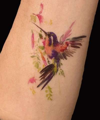  shady Whimsical Hummingbird tattoo