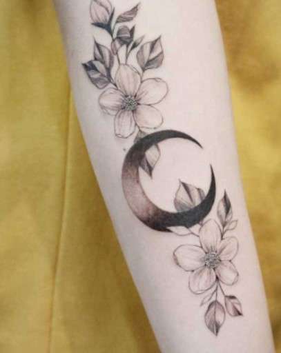 Whimsical flower Moon tattoo