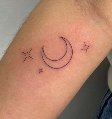simple Whimsical Moon tattoo