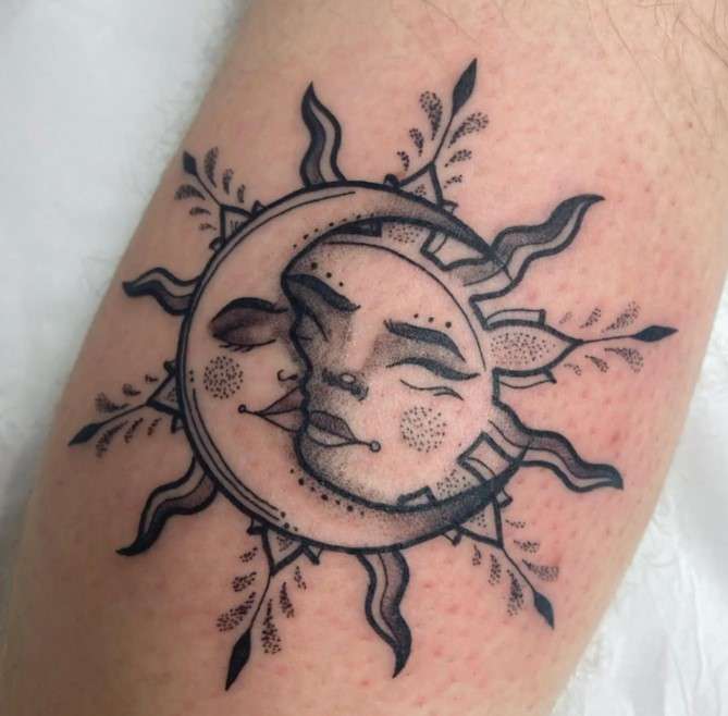 Whimsical sun Moon face tattoo