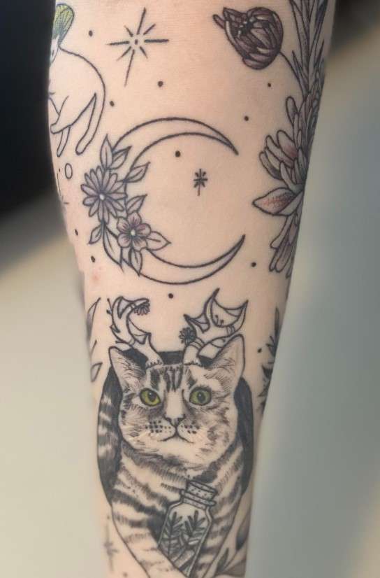 Whimsical Moon tattoo