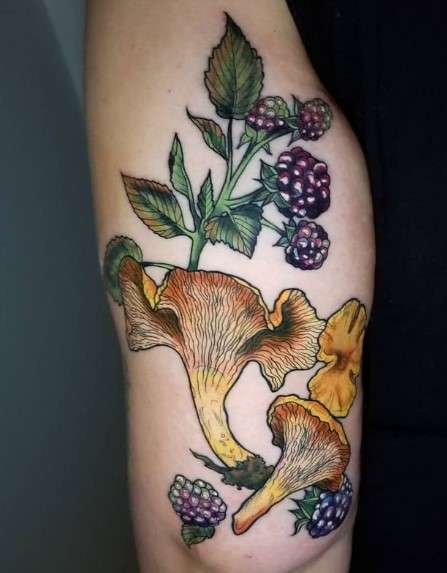 Whimsical Mushroom tattoo with berries