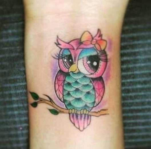 Whimsical adorable Owl Tattoo