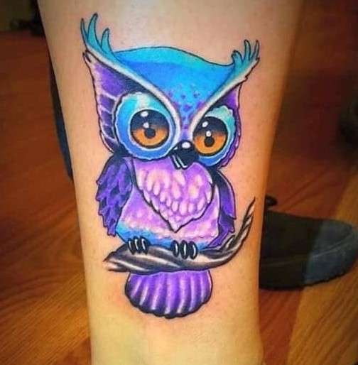 Whimsical purple Owl Tattoo