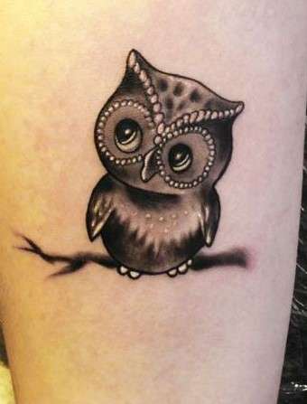 Whimsical black Owl Tattoo