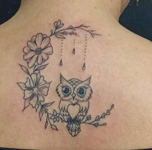 Whimsical Owl Tattoo spine